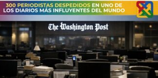 The Washington Post despide a cerca de 300 periodistas en una de las mayores reestructuraciones de su historia Sala de redacción del Washington Post casi vacía, con escritorios, computadoras y documentos en silencio, bajo la iluminación tenue del edificio.