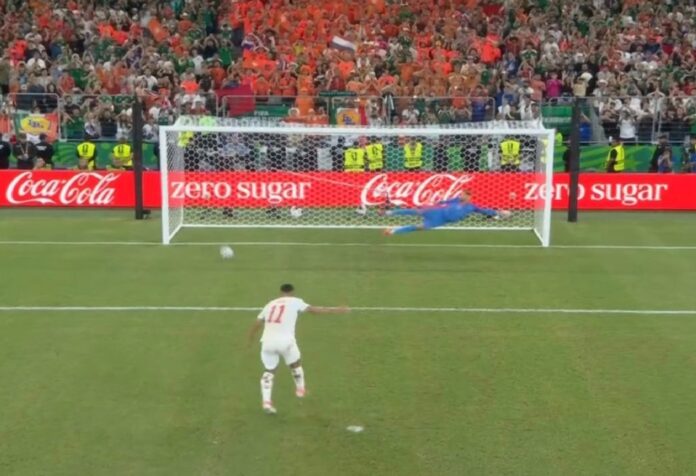 Jugador marroquí cobra un penalti decisivo mientras el portero de Países Bajos se lanza en la tanda del Mundial.