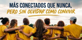 Cinco hábitos que los jóvenes no deberían perder en la era digital Grupo diverso de jóvenes abrazados durante una actividad al aire libre, símbolo de integración social, amistad y trabajo comunitario.